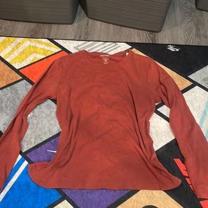 red/orange long sleeve shirt